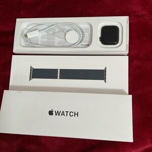 Apple Watch with Dark Gray Band and Charger